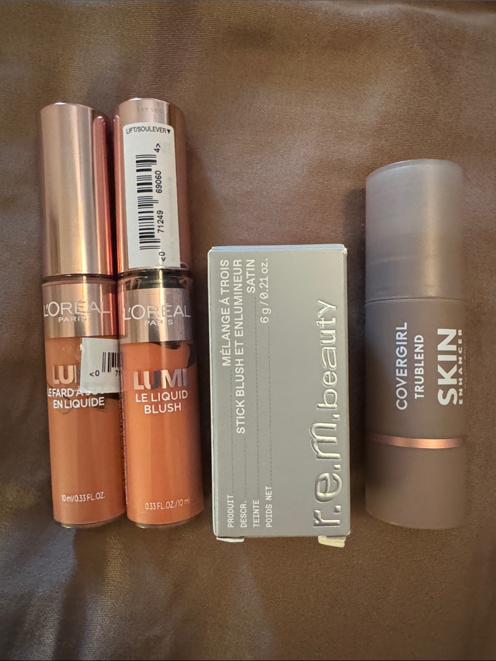 Loreal liquid blush, rem beauty stick blush, & Covergirl skin enhancer contour